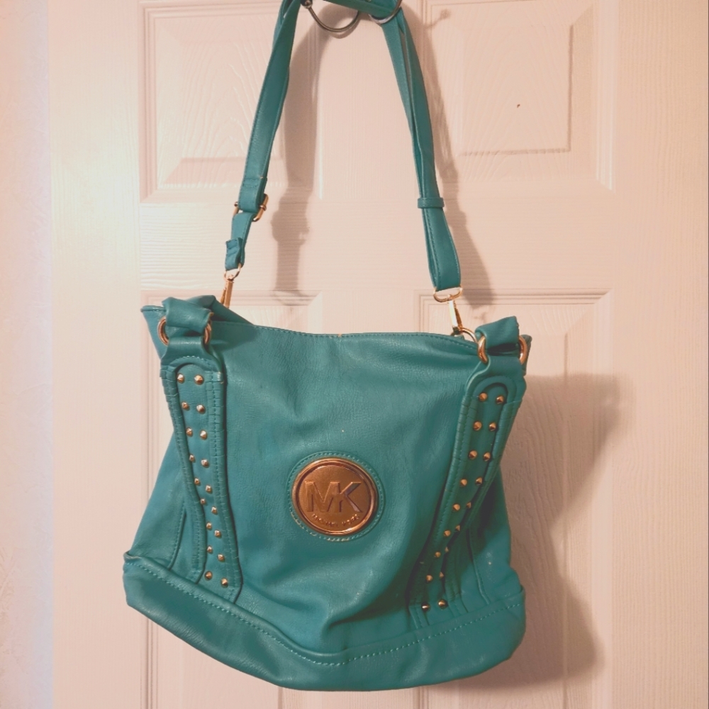 Michael kors turquoise hand bag